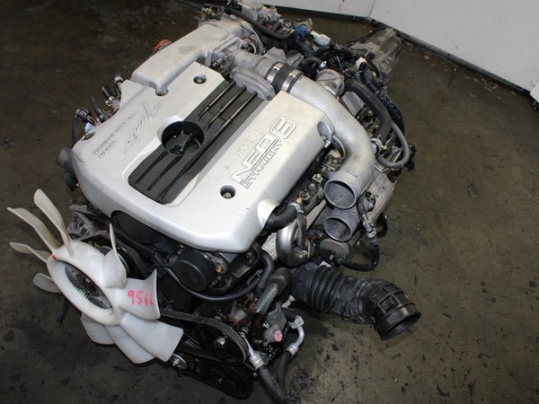 jdm-1998-2002-nissan-skyline-r34-gtt-25l-turbo-awd-motor-transmission-6.jpg JDM 1998-2002 Nissan Skyline R34 GTT 2.5L Turbo AWD Motor & Transmission 6 Cyl Engine - Image 1